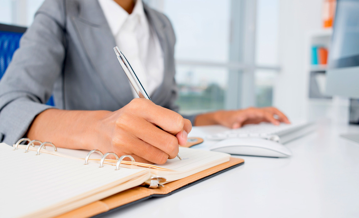 writing in notebook