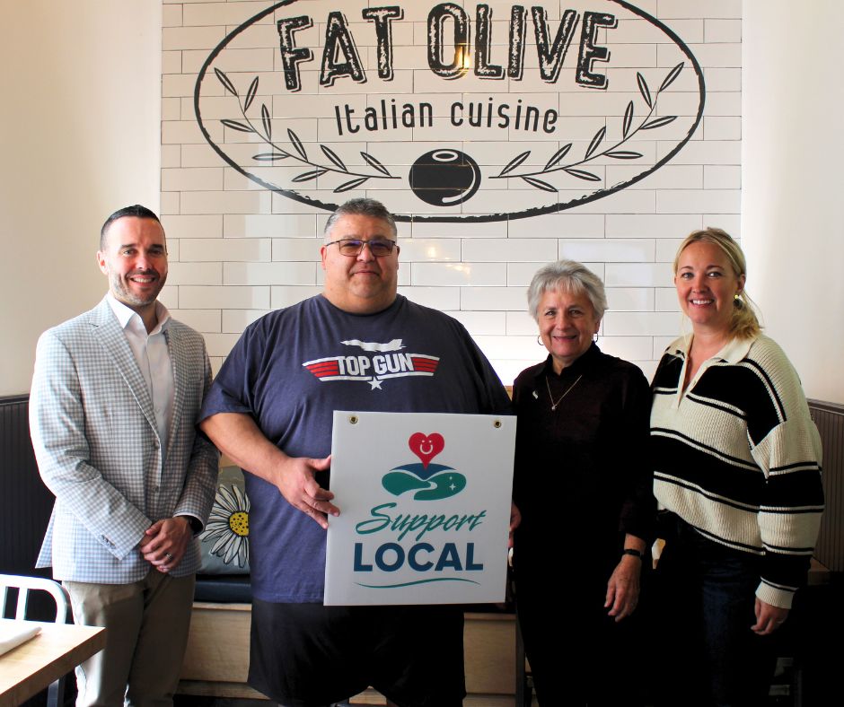 Dino Dassie Owner of Fat Olive with Council and CAO David Barrick