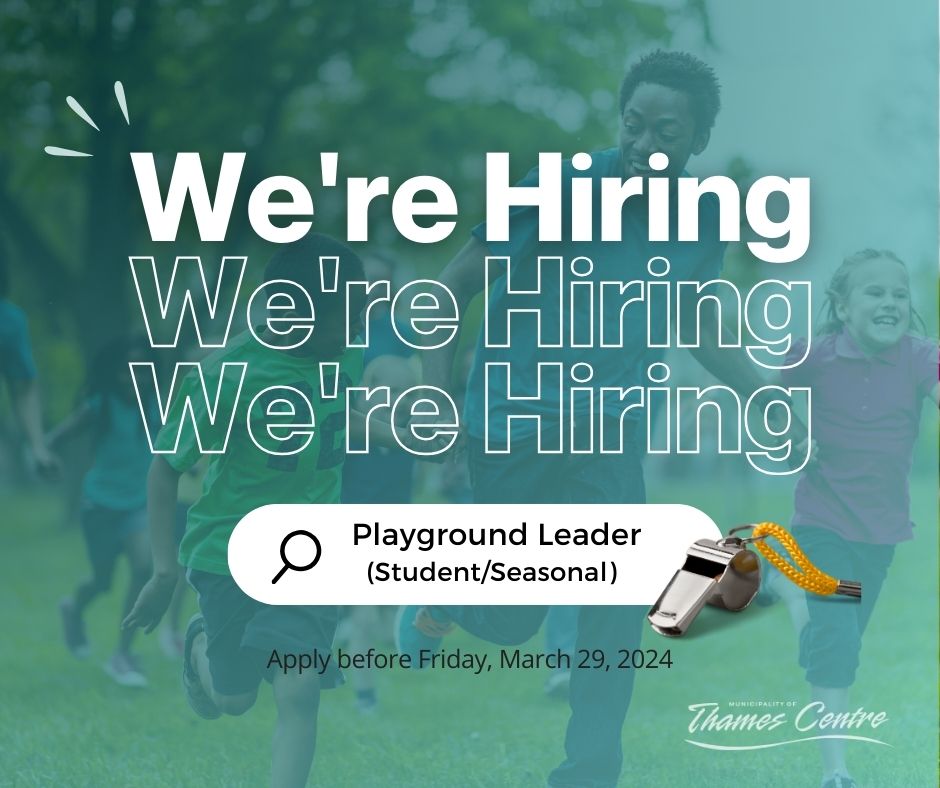 playground leader running with kids happy