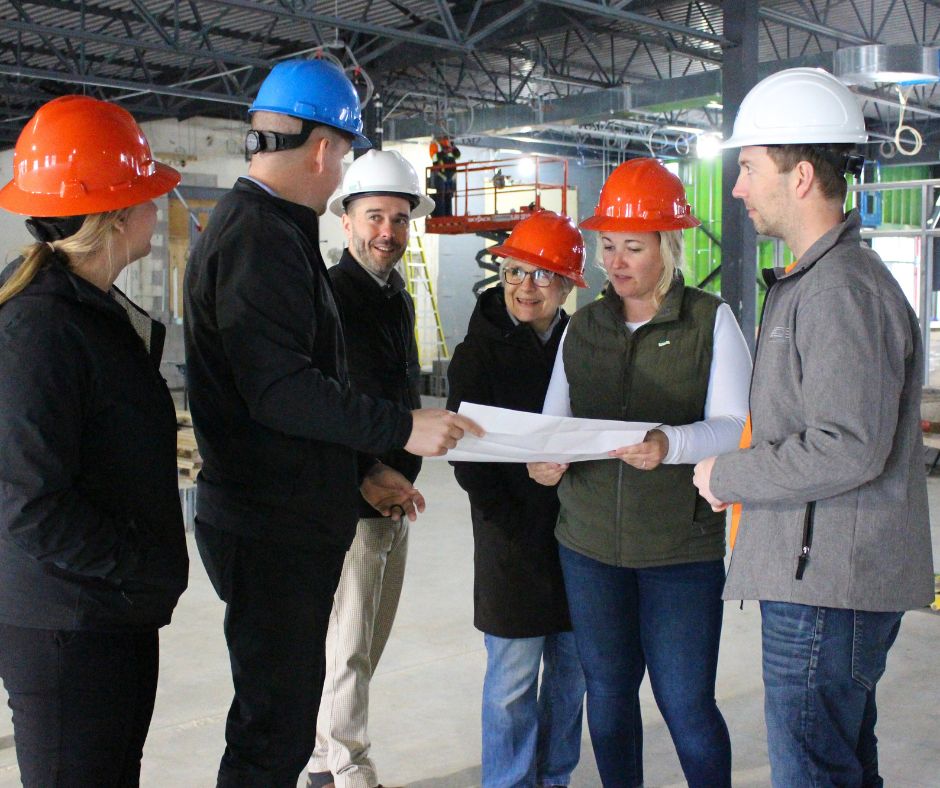 staff and council looking at site map