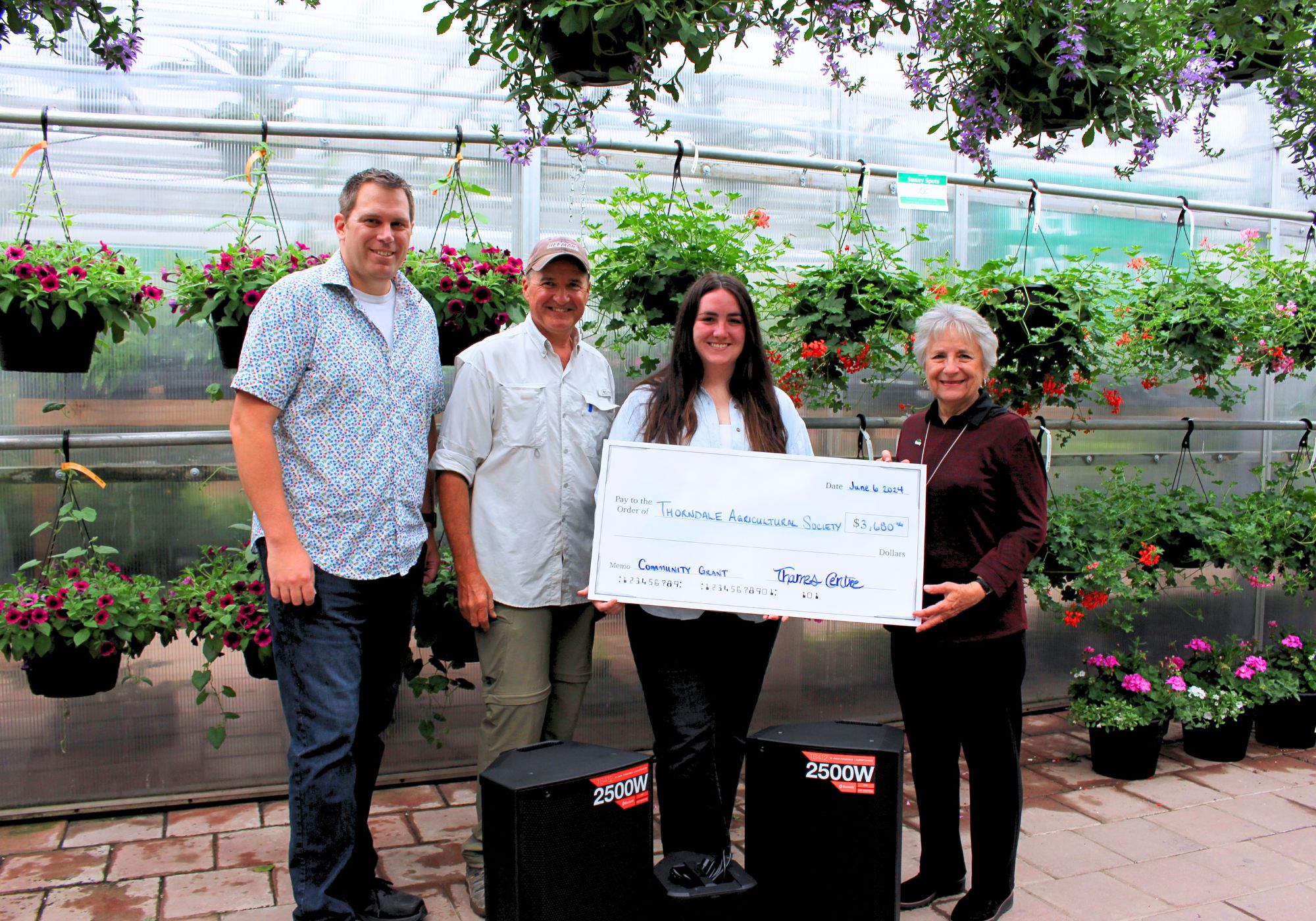 Matthew Little, Jim Razpotnik, Bridgette Heeman, and Mayor McMillan Presenting Cheque