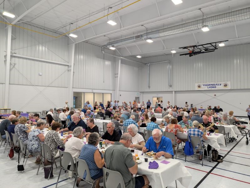 residents at the eats and beats event eating dinner