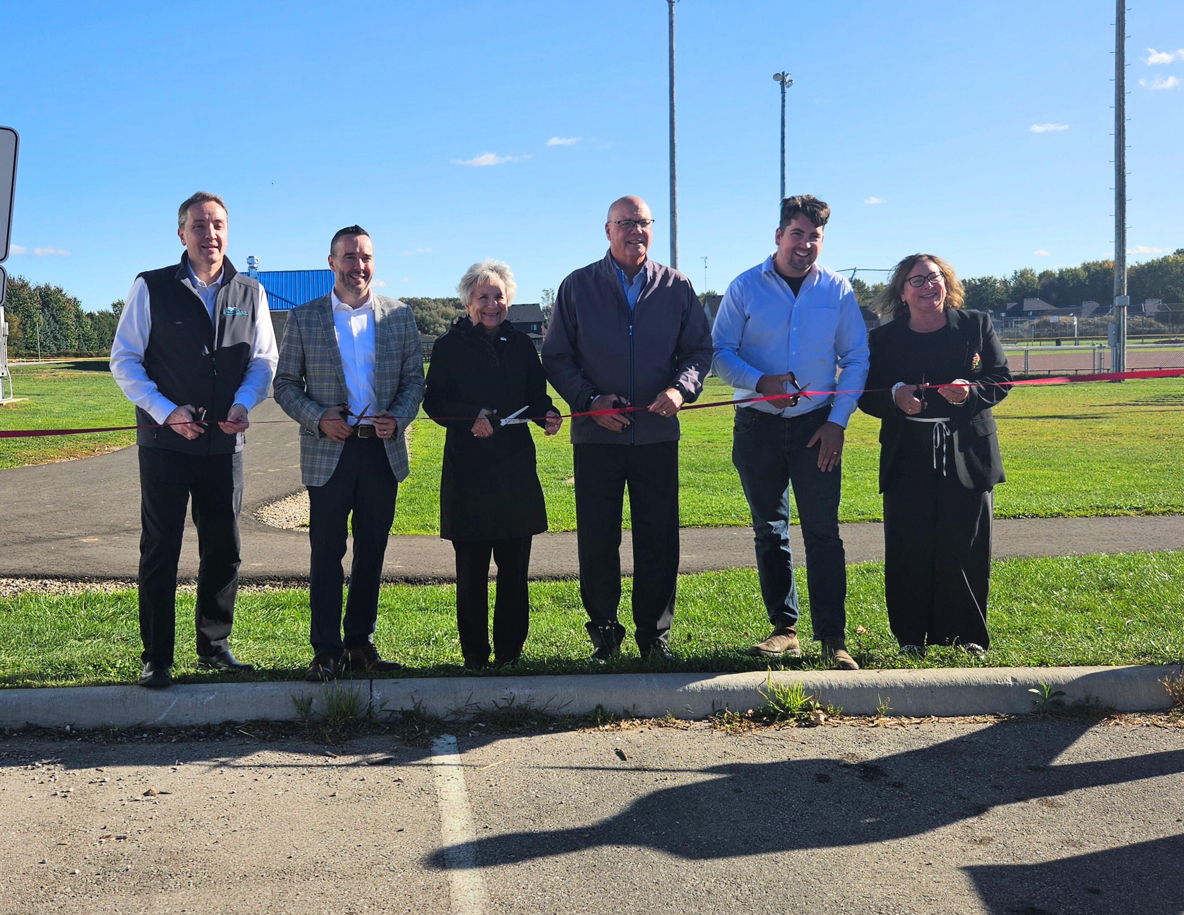 mpp flack with council and staff ribbon cutting